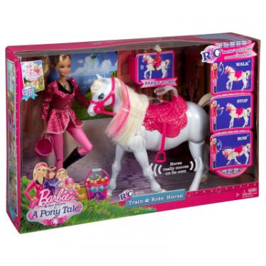 Кукла Barbie с коньком Фото